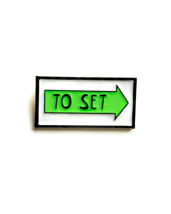 To set Vancouver arrow sign lapel pin