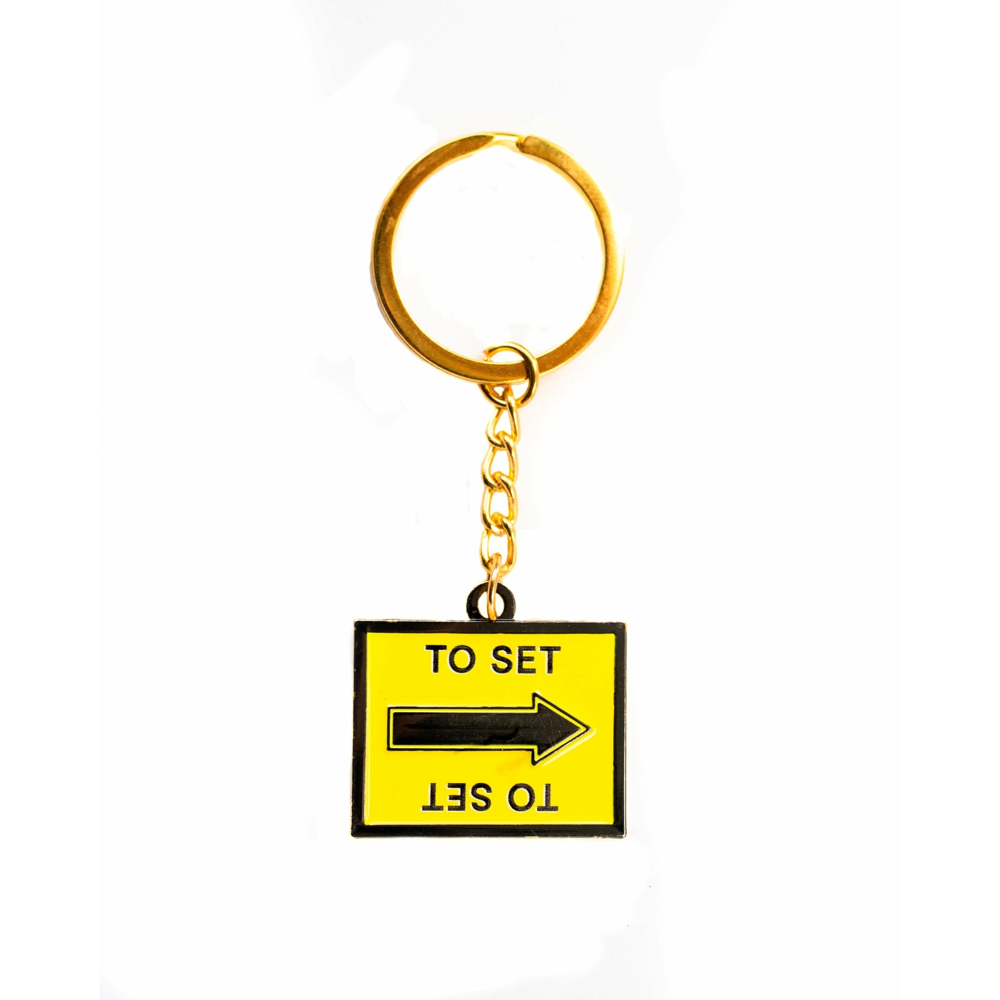 to set film black and yellow arrow sign keychain